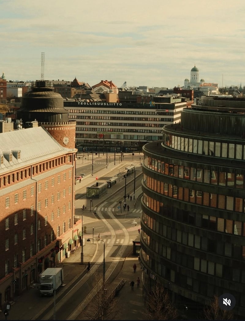Helsinki curved facade and rooftops with light snow dusting
