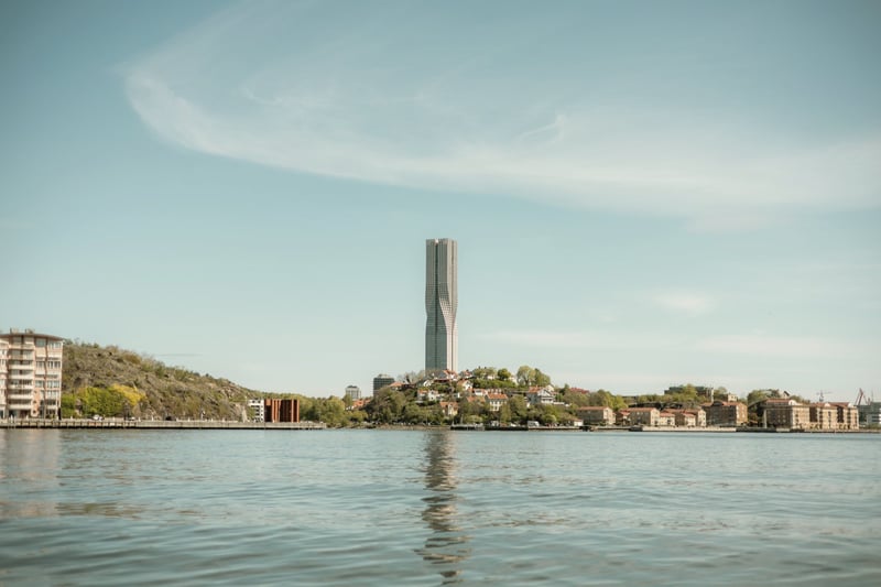 Karlatornet tower over the Gothenburg waterfront, calm water