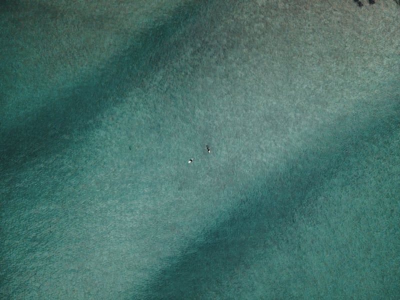 Aerial view of teal water